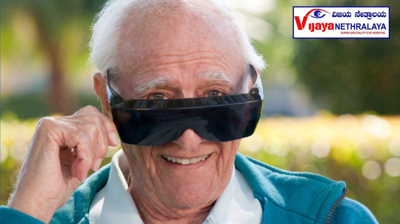 A old man wearing black spectacles after cataract surgery