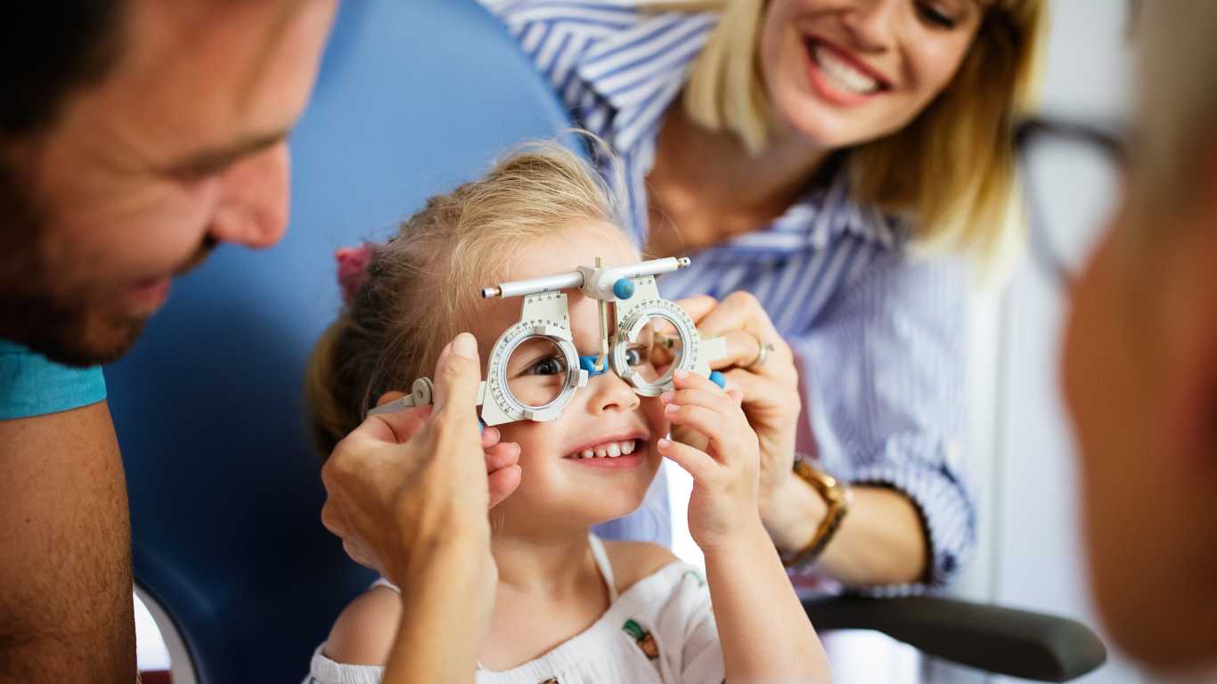 Pediatric Ophthalmologist testing little girl